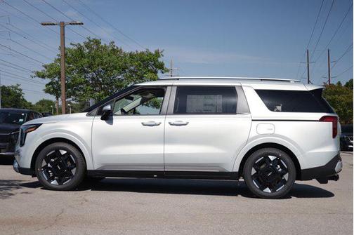 Ivory Silver 2026 Kia Carnival EX