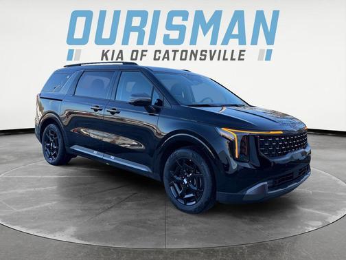 Aurora Blue 2026 Kia Carnival Hybrid SX Passenger Van