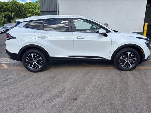 White 2023 Kia Sportage Hybrid EX