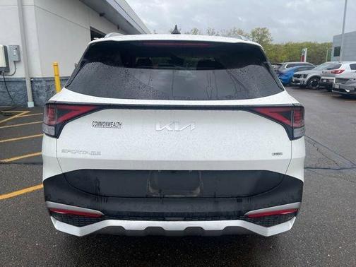 White 2023 Kia Sportage Hybrid EX