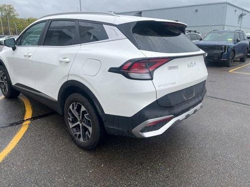 White 2023 Kia Sportage Hybrid EX