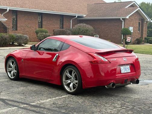 Solid Red 2009 Nissan 370Z Touring