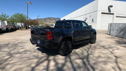 Forged Blue Metallic 2026 RAM 1500 RHO Crew Cab 4x4 5'7' Box