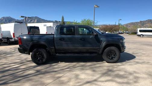 Forged Blue Metallic 2026 RAM 1500 RHO Crew Cab 4x4 5'7' Box