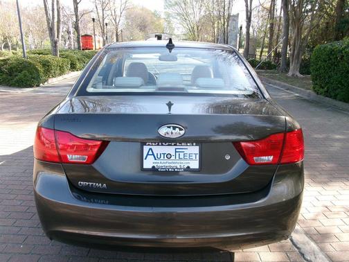 Gold 2010 Kia Optima LX