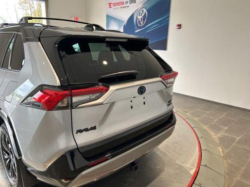 Silver Sky Metallic/Midnight Black Metallic 2024 Toyota RAV4 Hybrid SE
