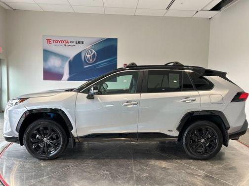 Silver Sky Metallic/Midnight Black Metallic 2024 Toyota RAV4 Hybrid SE