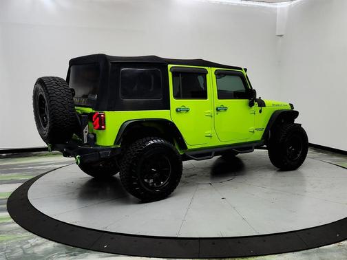 Green 2013 Jeep Wrangler Unlimited Rubicon