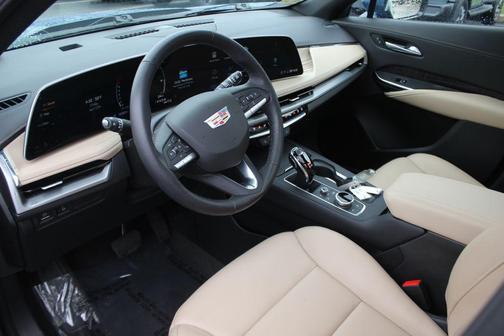 Deep Sea Metallic 2024 Cadillac XT4 Premium Luxury