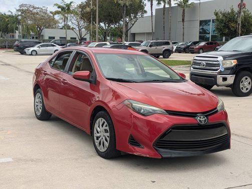 Barcelona Red Metallic 2019 Toyota Corolla LE