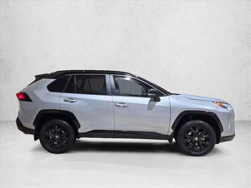 Silver Sky Metallic/Midnight Black Metallic 2024 Toyota RAV4 Hybrid SE
