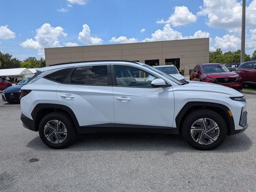 Creamy White Pearl 2025 Hyundai TUCSON Hybrid Blue