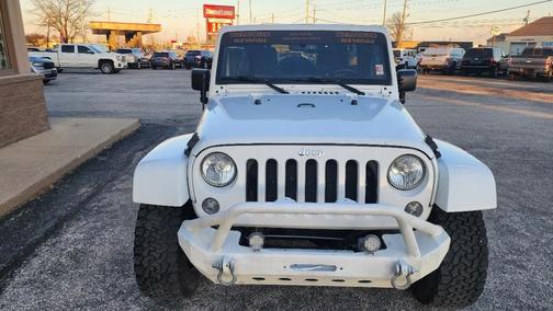 White 2015 Jeep Wrangler Unlimited Sahara