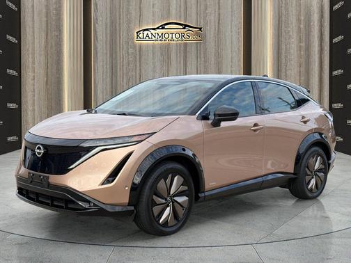 Sunrise Copper Pearl/Black Diamond Pearl 2023 Nissan ARIYA PREMIERE