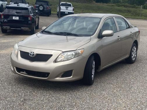 Tan 2010 Toyota Corolla LE