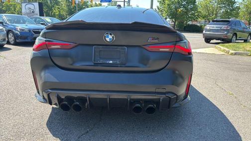 Black Sapphire Metallic 2024 BMW M4 Competition xDrive