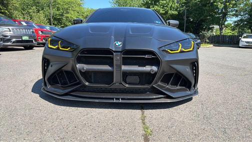 Black Sapphire Metallic 2024 BMW M4 Competition xDrive