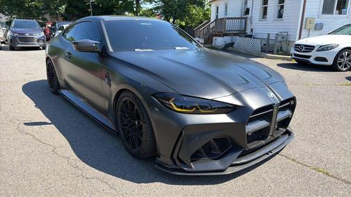 Black Sapphire Metallic 2024 BMW M4 Competition xDrive