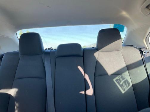 Wind Chill Pearl/Midnight Black Metallic 2023 Toyota Corolla LE