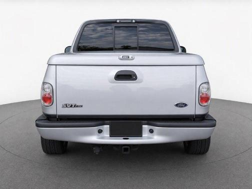 Silver Clearcoat Metallic 2001 Ford F-150 SVT Lightning Flareside
