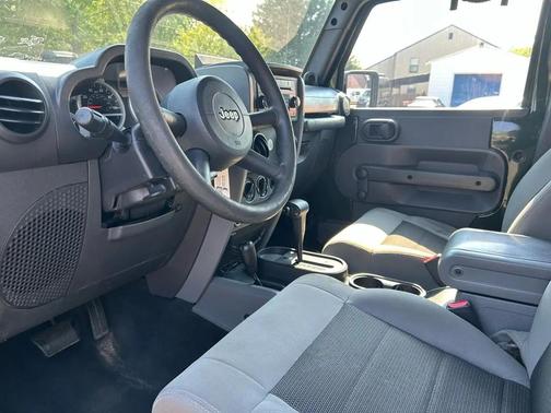 Green 2010 Jeep Wrangler Unlimited Sport