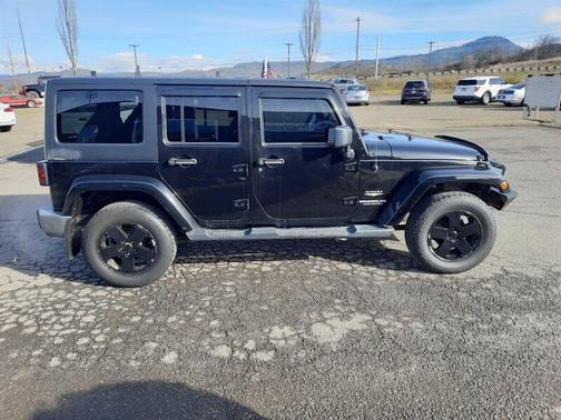 Black 2012 Jeep Wrangler Unlimited Sahara