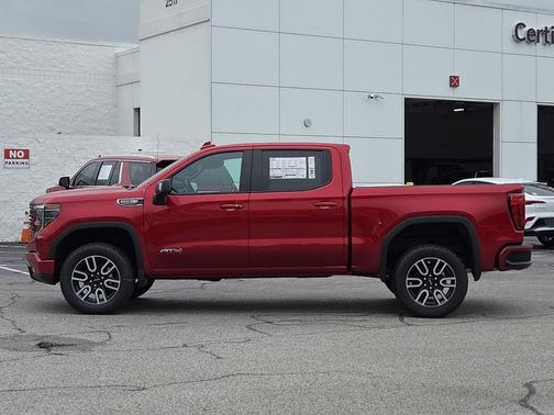 Volcanic Red Tintcoat 2026 GMC Sierra 1500 AT4