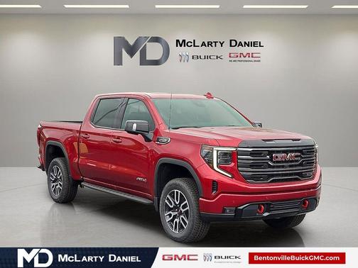 Volcanic Red Tintcoat 2026 GMC Sierra 1500 AT4