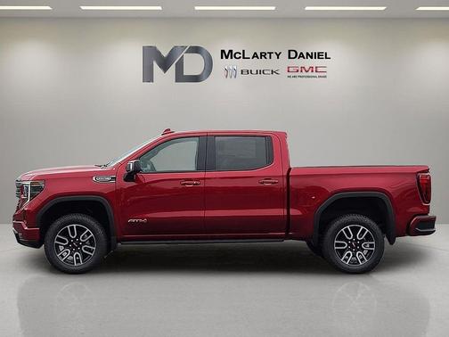 Volcanic Red Tintcoat 2026 GMC Sierra 1500 AT4