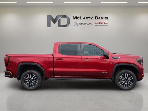 Volcanic Red Tintcoat 2026 GMC Sierra 1500 AT4