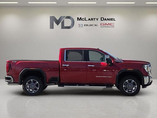 Volcanic Red Tintcoat 2026 GMC Sierra 2500 SLT