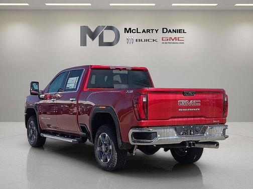 Volcanic Red Tintcoat 2026 GMC Sierra 2500 SLT