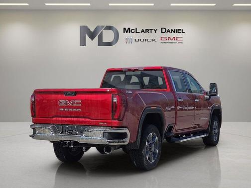 Volcanic Red Tintcoat 2026 GMC Sierra 2500 SLT