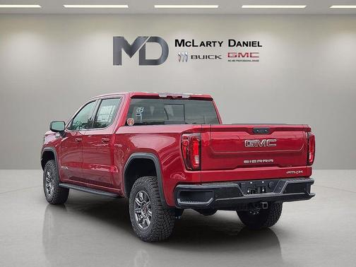 Volcanic Red Tintcoat 2026 GMC Sierra 1500 AT4X
