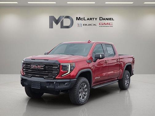 Volcanic Red Tintcoat 2026 GMC Sierra 1500 AT4X
