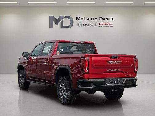 Volcanic Red Tintcoat 2026 GMC Sierra 1500 AT4X