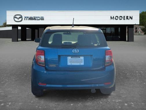 Blue 2013 Scion xD Base