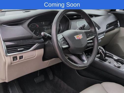 Stellar Black Metallic 2023 Cadillac XT4 Premium Luxury