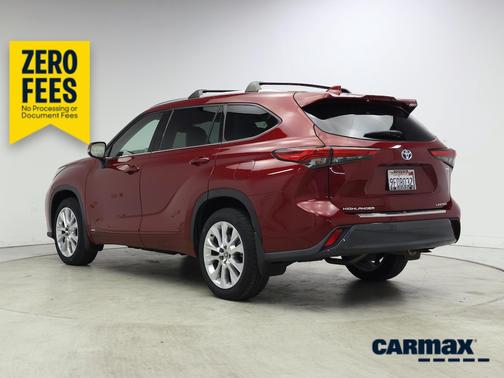 Red 2023 Toyota Highlander Hybrid Limited