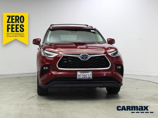 Red 2023 Toyota Highlander Hybrid Limited