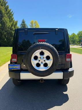 Black 2013 Jeep Wrangler Unlimited Sahara