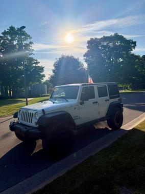 White 2016 Jeep Wrangler Unlimited Sport
