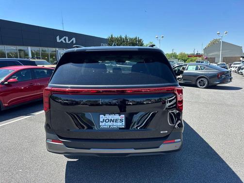 Aurora Black Pearl 2026 Kia Carnival Hybrid SX