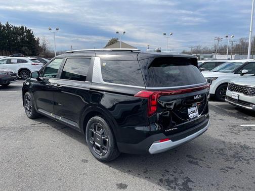 Aurora Black Pearl 2026 Kia Carnival Hybrid EX
