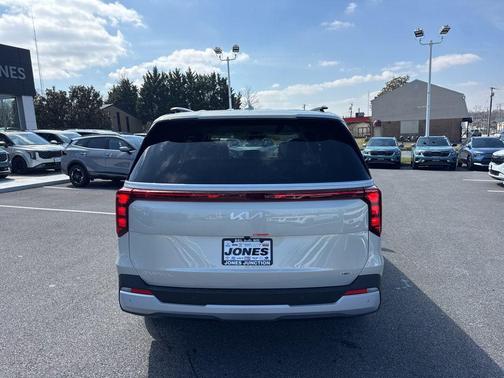Ivory Silver 2026 Kia Carnival Hybrid EX
