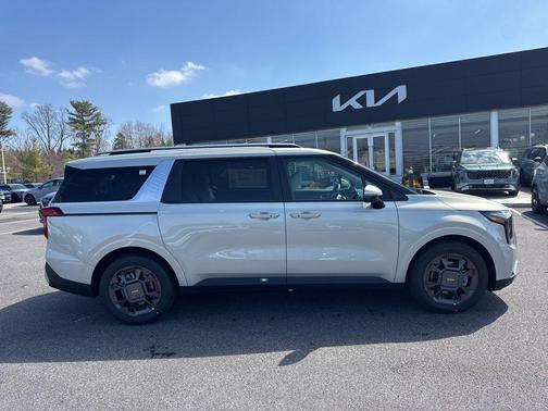 Ivory Silver 2026 Kia Carnival Hybrid EX