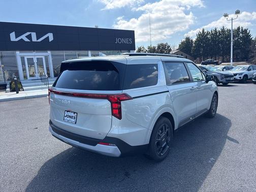 Ivory Silver 2026 Kia Carnival Hybrid EX