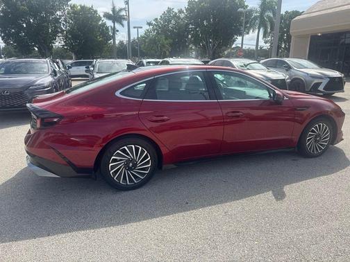 Ultimate red 2024 Hyundai SONATA Hybrid Limited