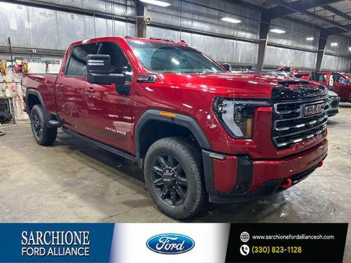 Volcanic Red Tintcoat 2025 GMC Sierra 2500 AT4