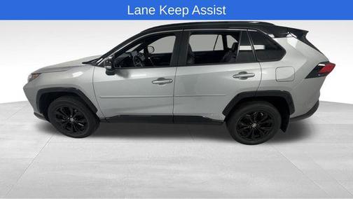 Silver Sky Metallic/Midnight Black Metallic 2024 Toyota RAV4 Hybrid SE
